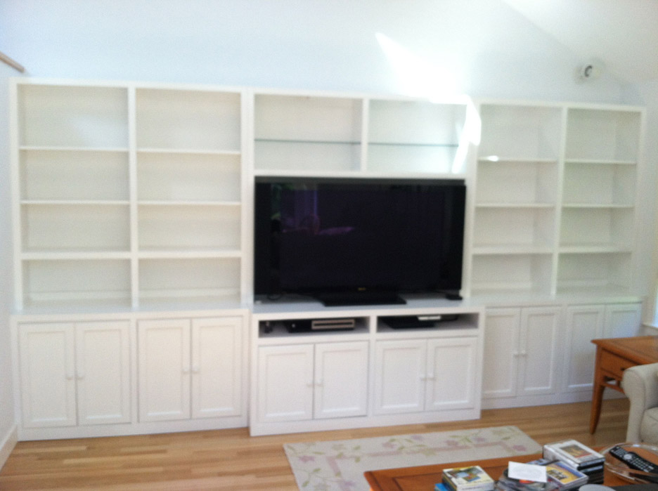 CUSTOM WALL UNITS & MANTELS - UNFINISHED BUSINESS OF
